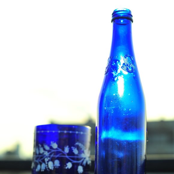 Exquisite Cobalt Blue Water Glass Bottle with Floral 3D Artwork - Picture 9 of 14